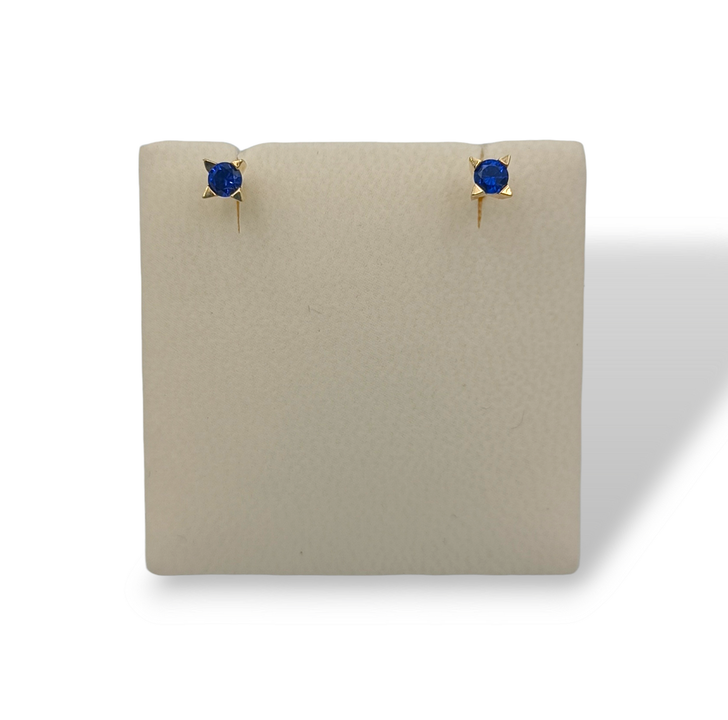 Gold earrings with blue synthetic Zircon stones