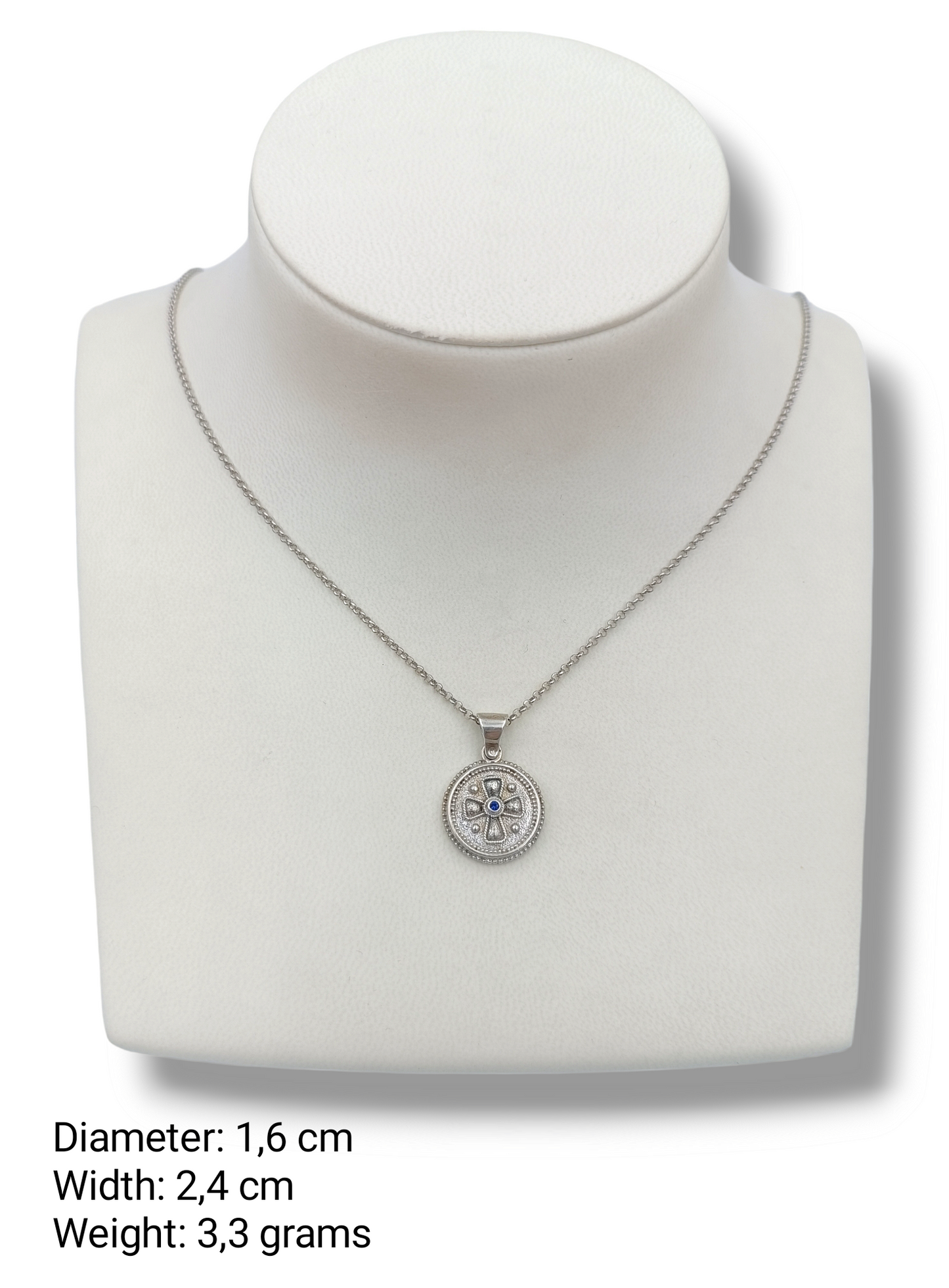Silver Cross pendant with synthetic blue Zircon stone