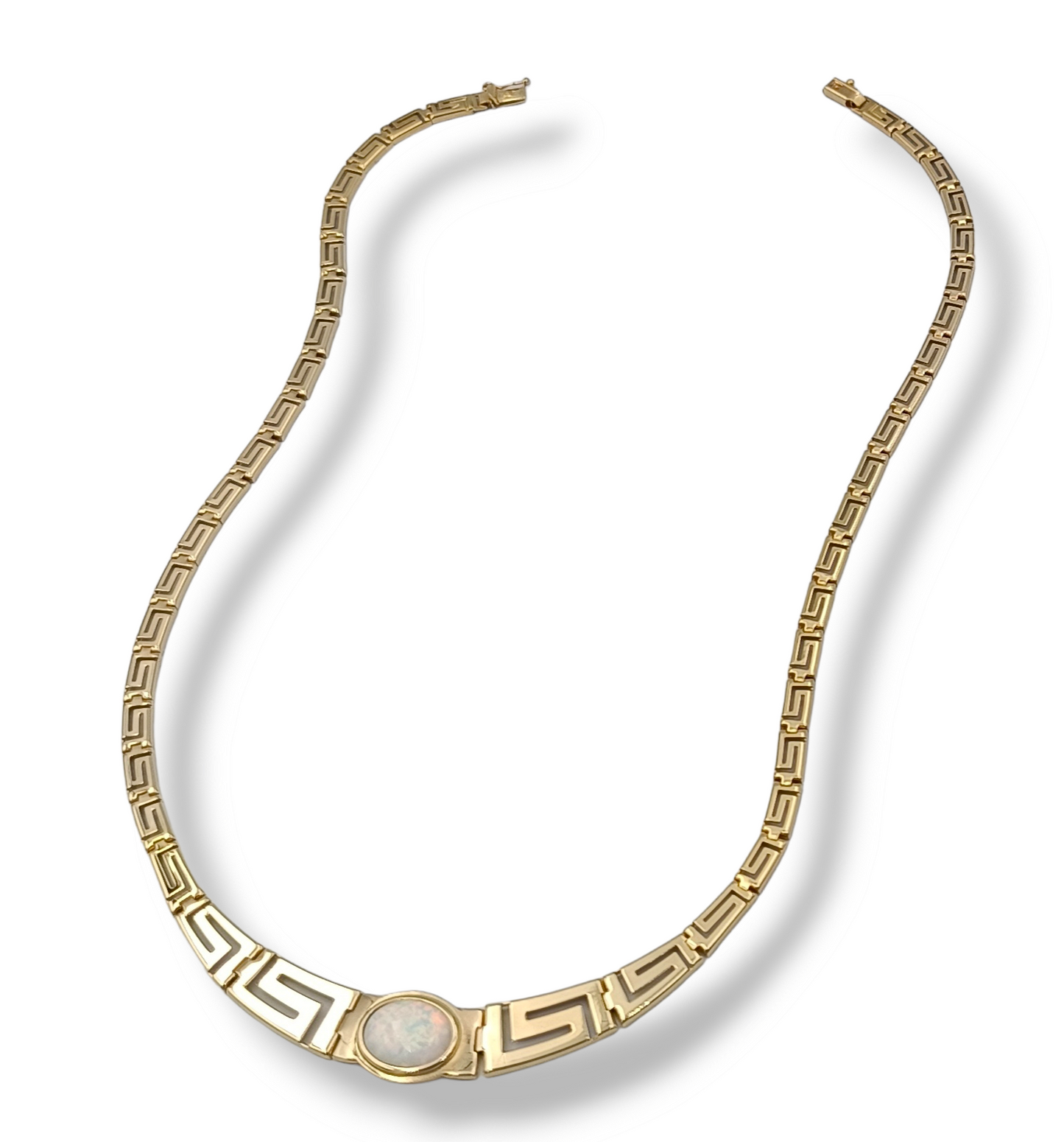 Gold Meander design necklace with white synthetic Opal stone