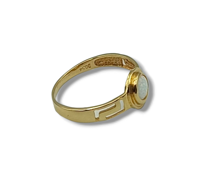 Gold Meander design ring with white synthetic Opal stone