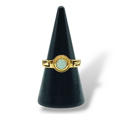 Gold Meander design ring with white synthetic Opal stone