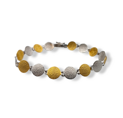 Silver two-toned Disc of Phaistos design bracelet