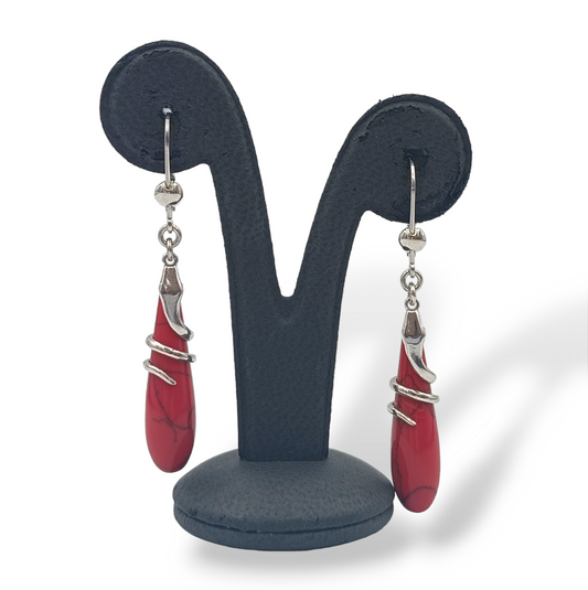 Silver snake design earrings with red Coral stones