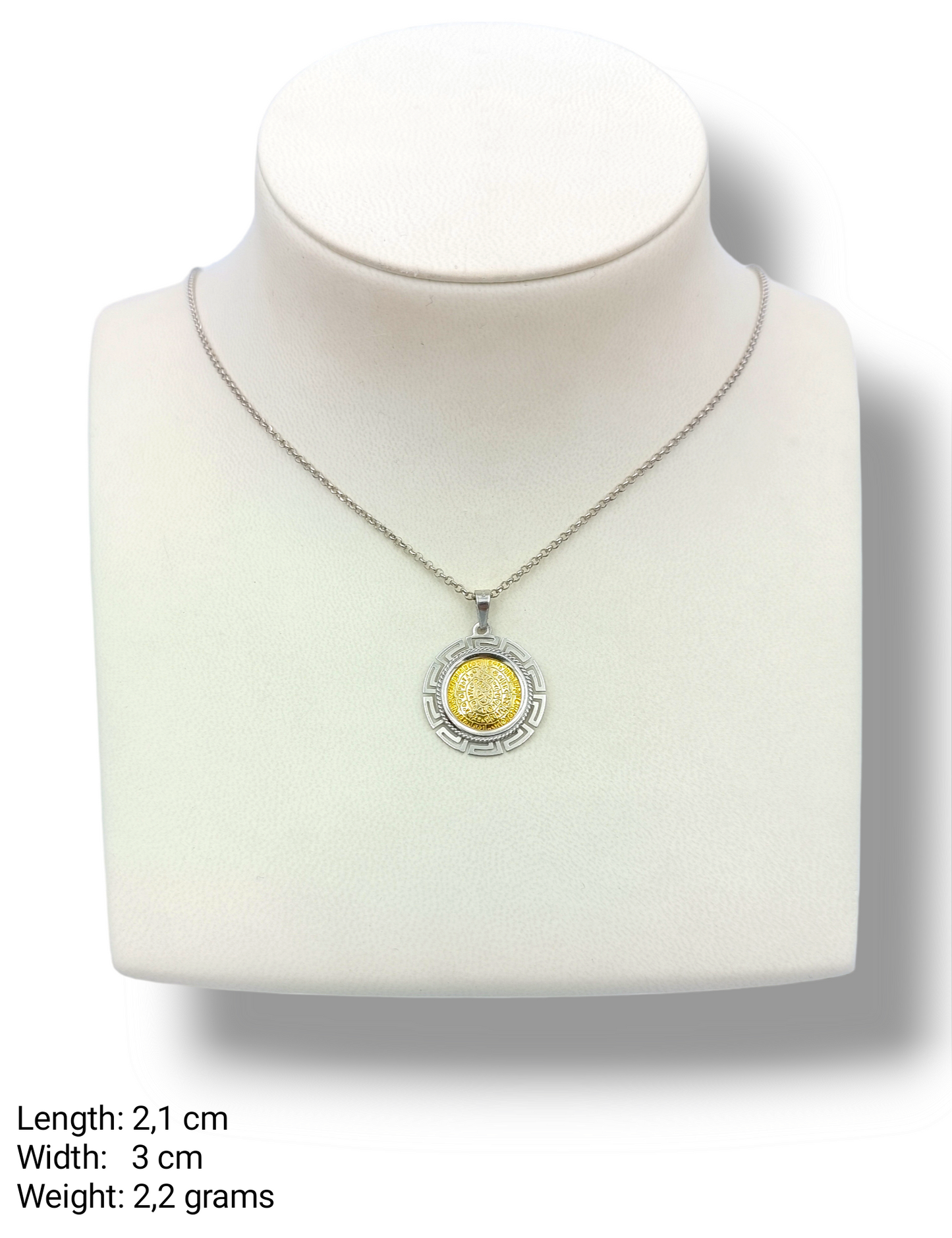 Silver two-toned Disc of Phaistos pendant enclosed with Meander design